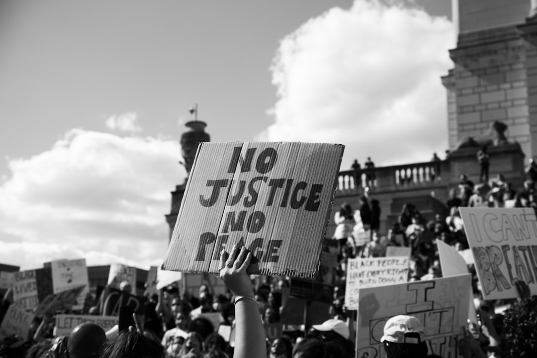 grayscale photo of people on street