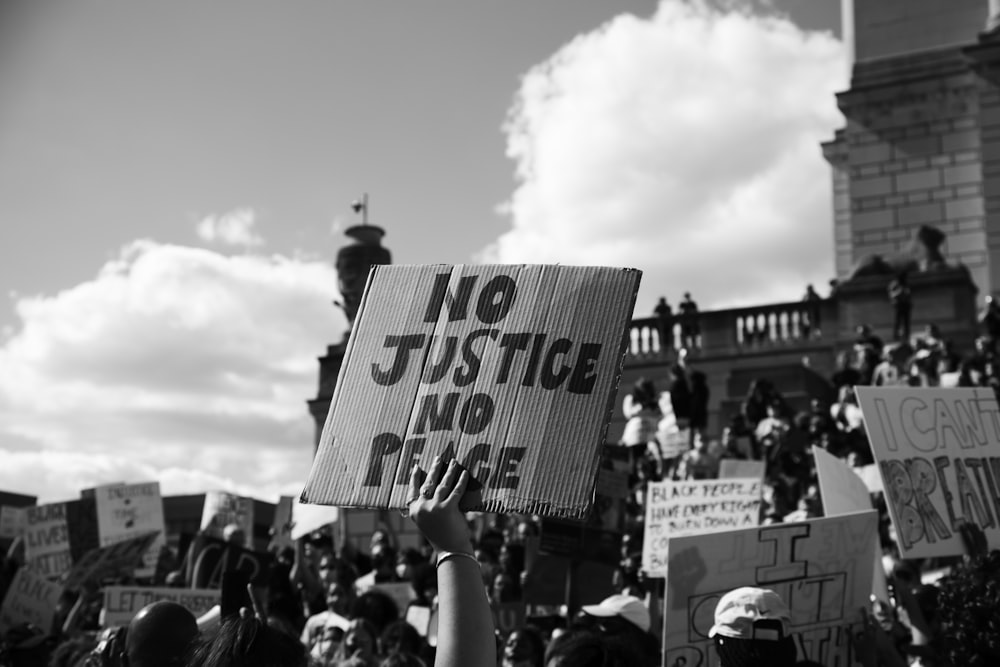 grayscale photo of people on street