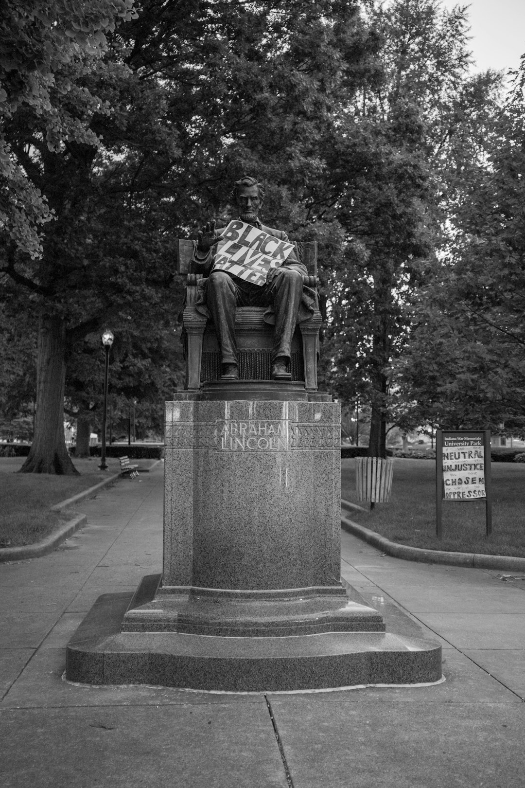grayscale photo of statue of man