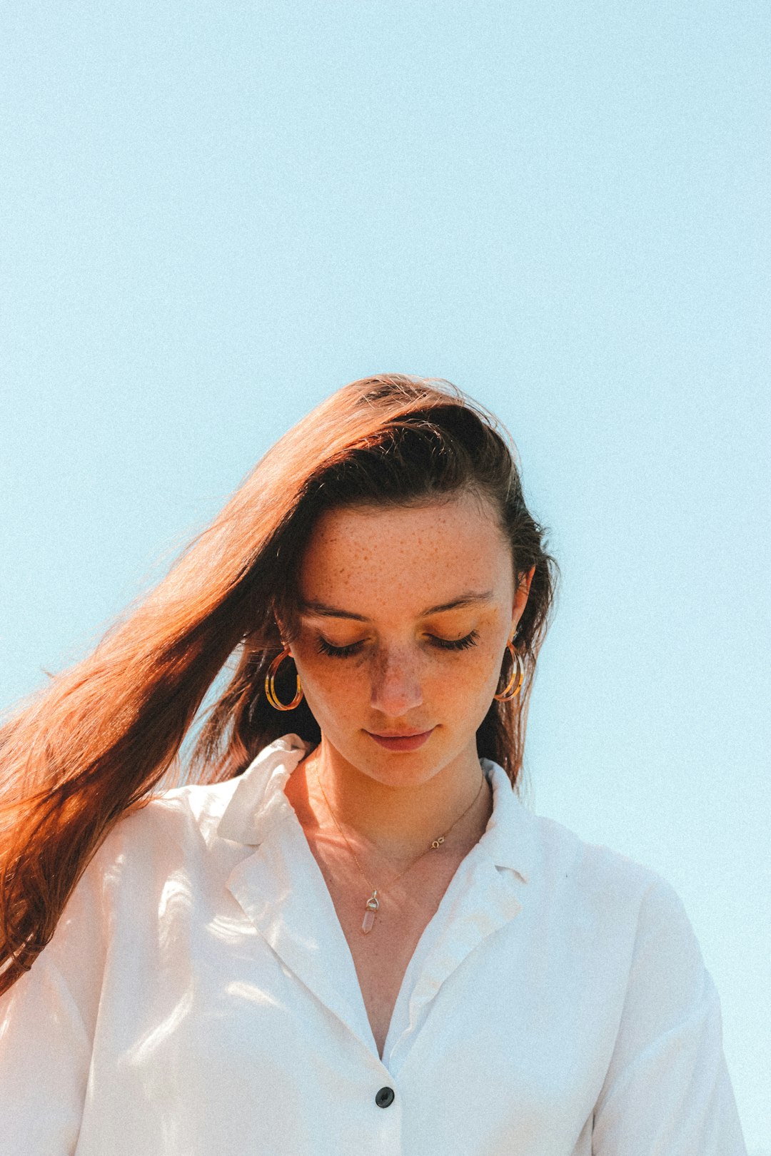 woman in white button up shirt