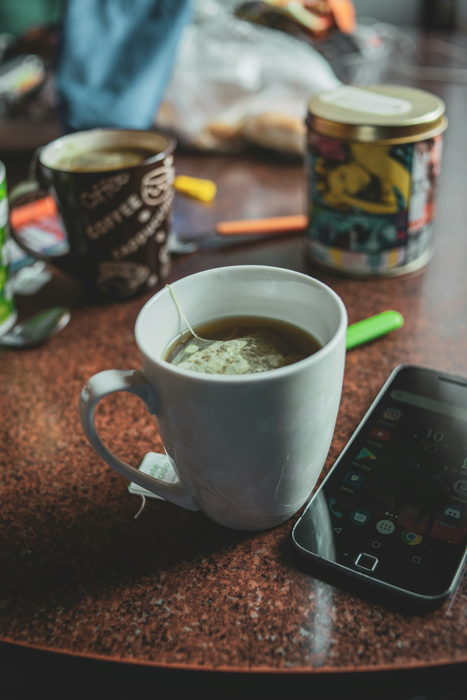 Nikon D610 + Nikon AF-S DX Nikkor 35mm F1.8G sample photo. White ceramic mug with photography