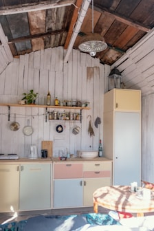 white and brown wooden kitchen cabinet