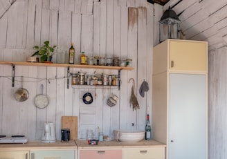 white and brown wooden kitchen cabinet