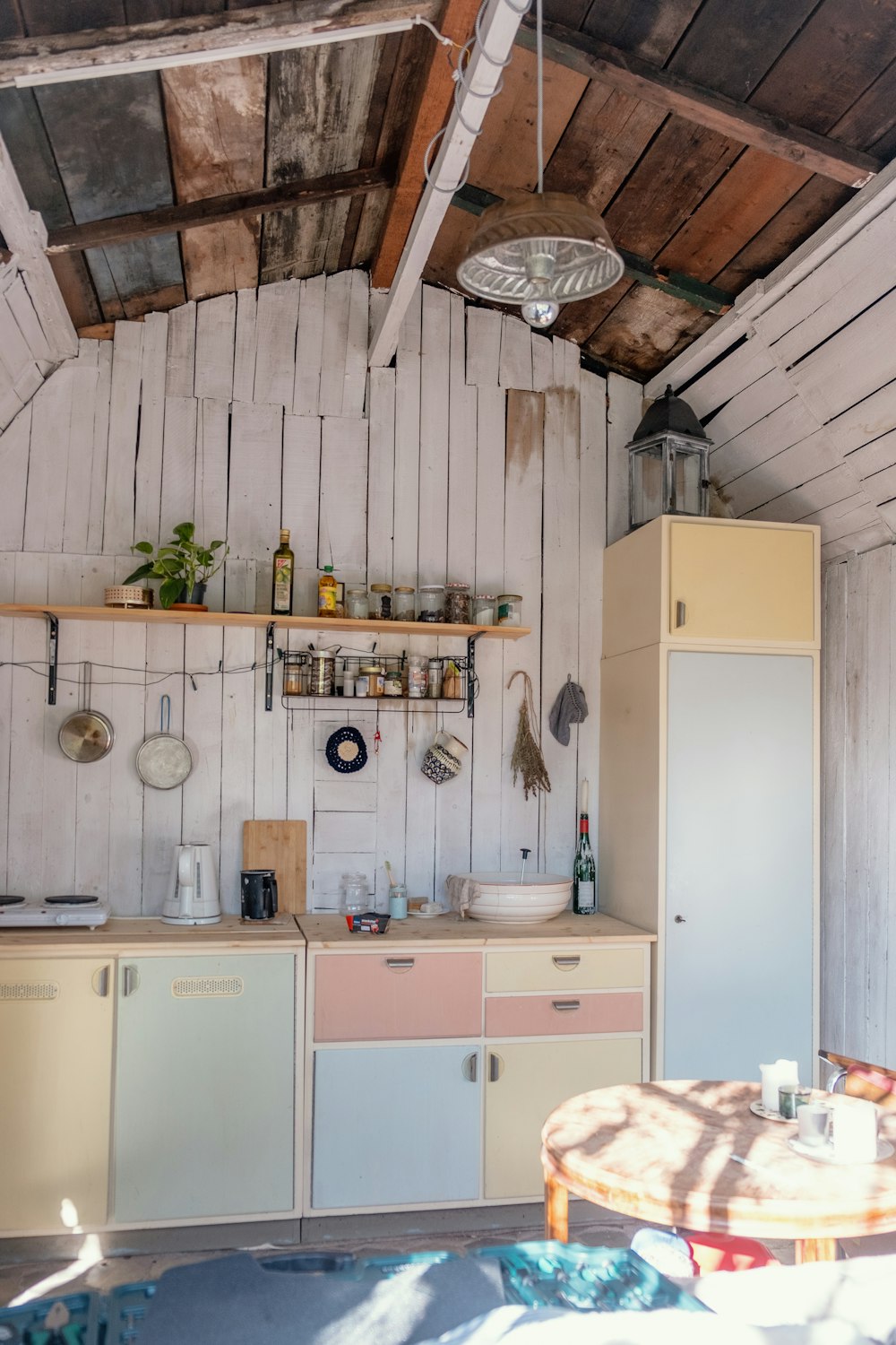 white and brown wooden kitchen cabinet