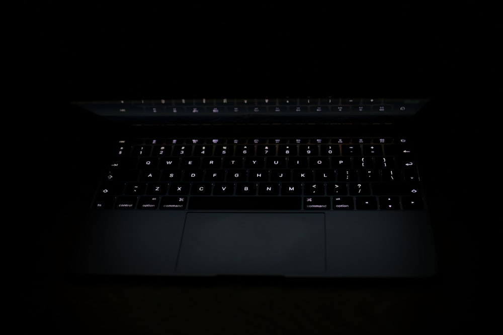 black and silver laptop computer
