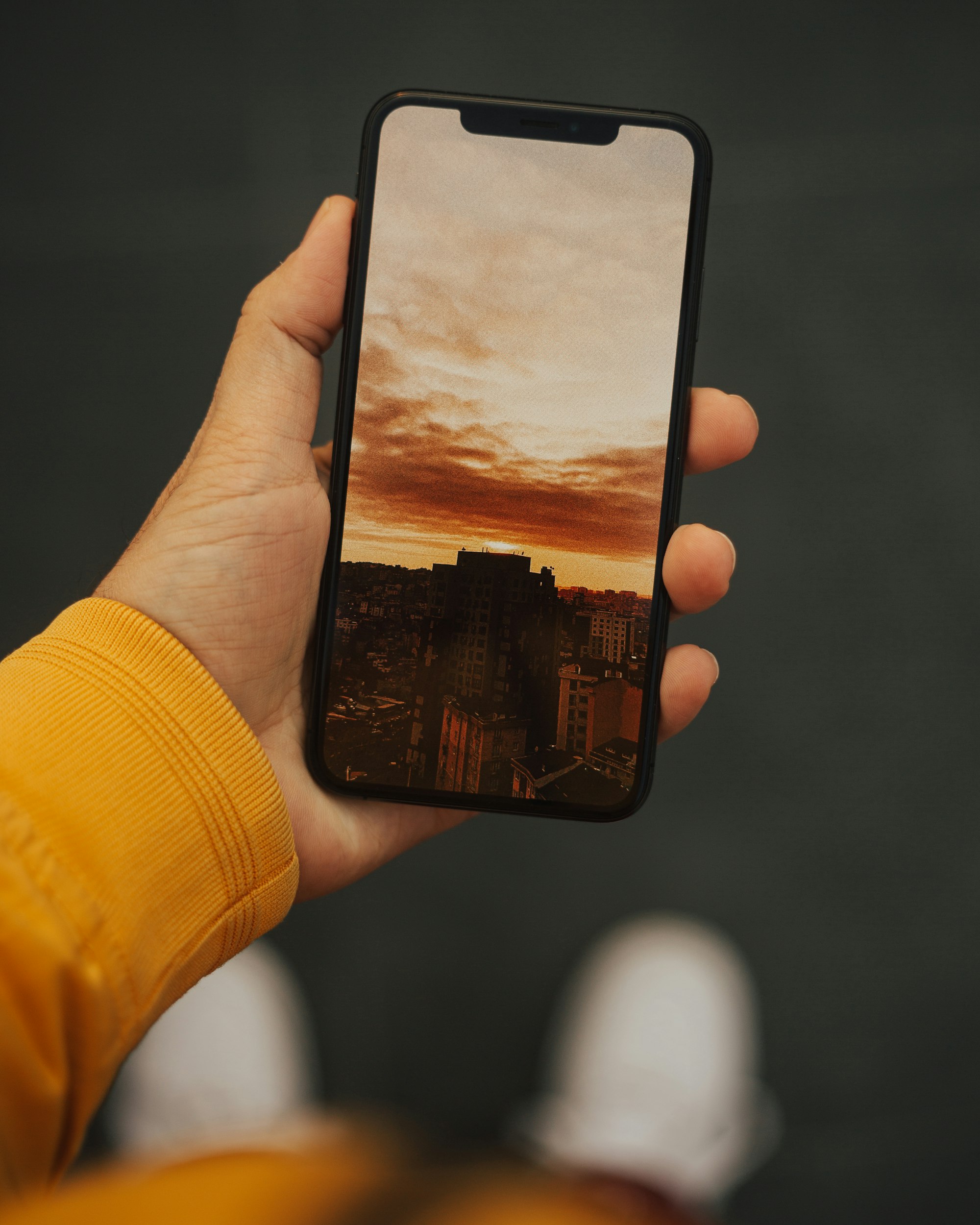 person holding black iphone 5