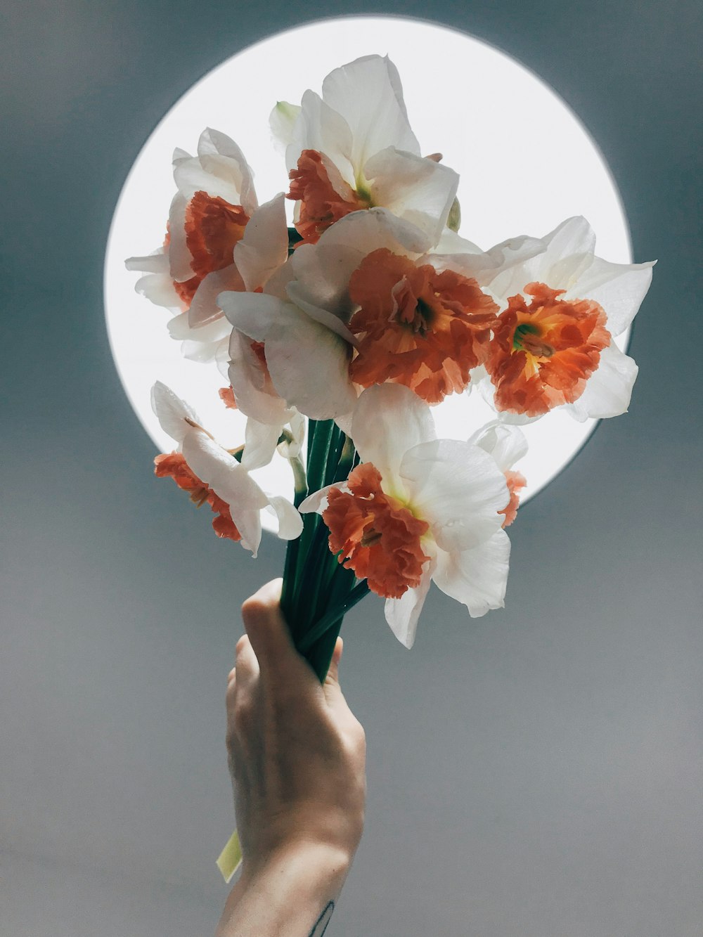 white and orange flower bouquet