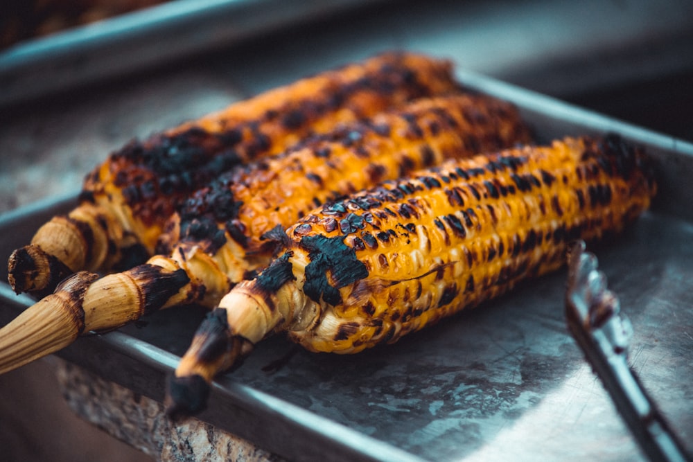 grilled meat on black tray