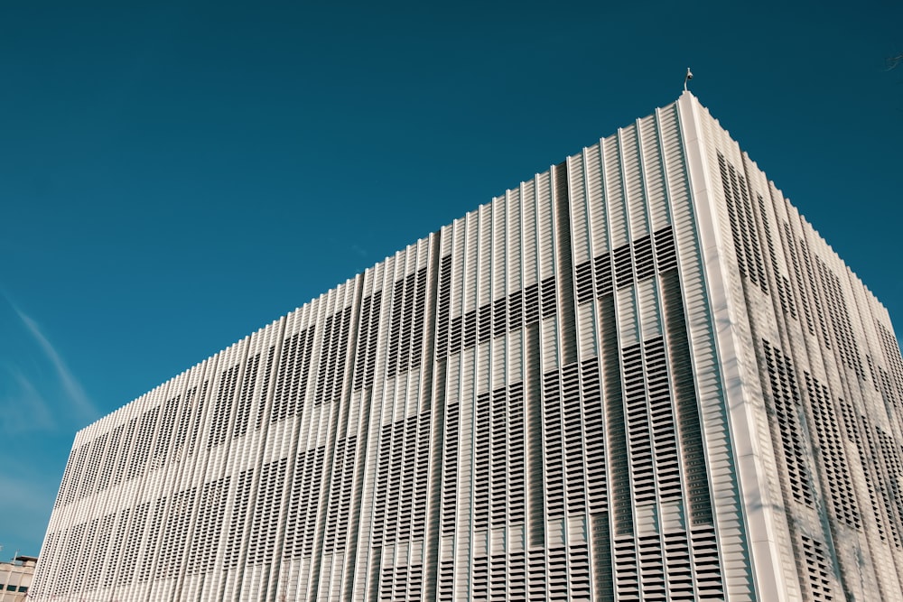 white concrete building under blue sky during daytime