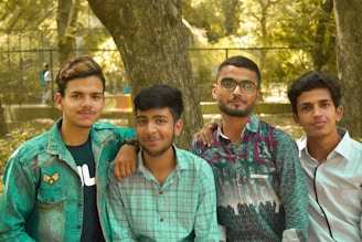 man in green button up shirt beside woman in green cardigan