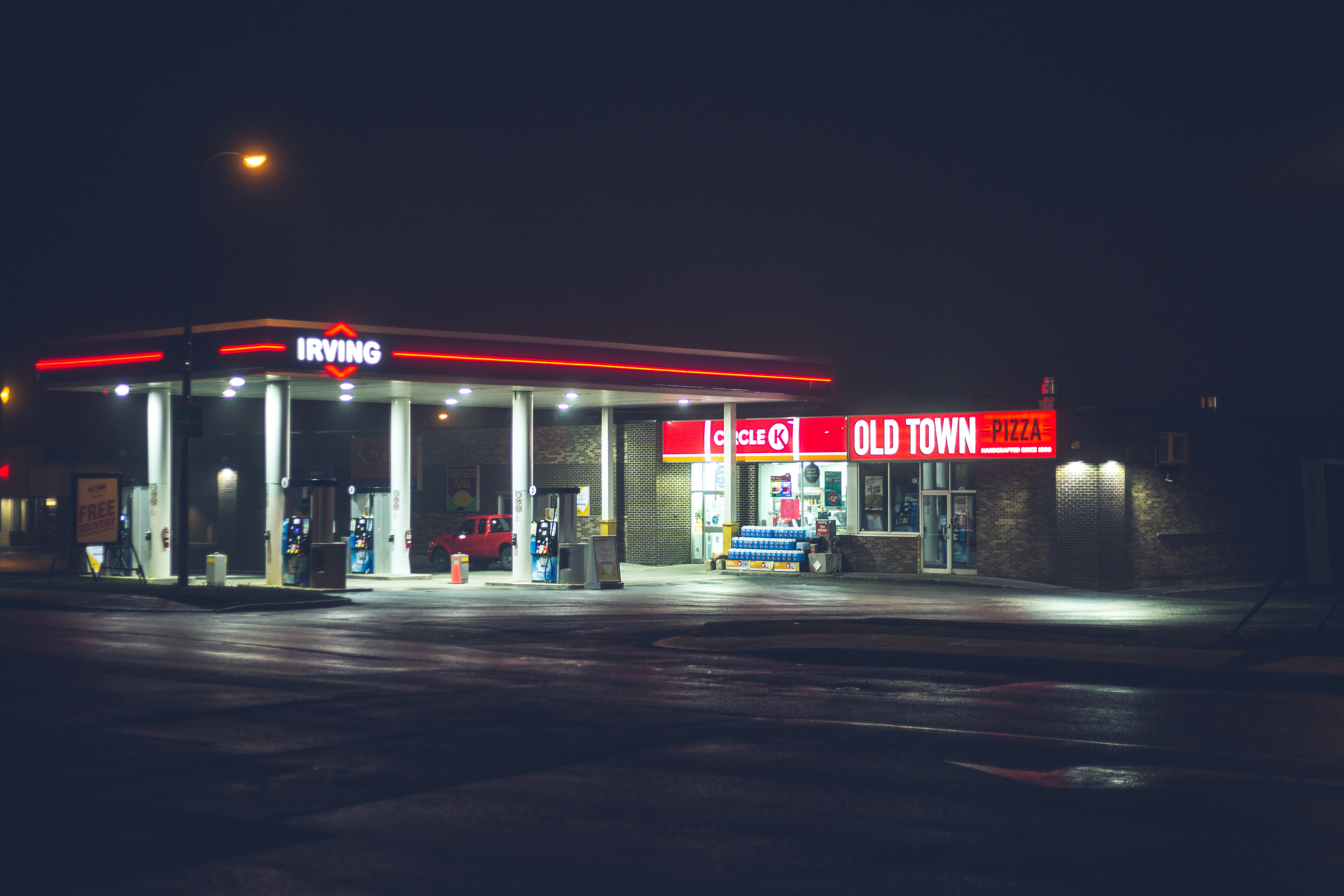 Red And White Store Front During Night Time Photo Free Machine Image On Unsplash