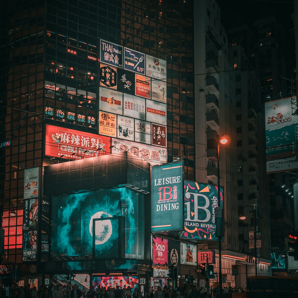 people walking on street during nighttime