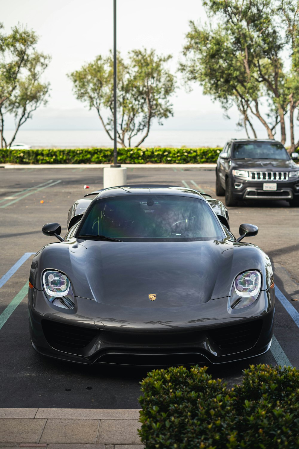 black porsche 911 on road during daytime