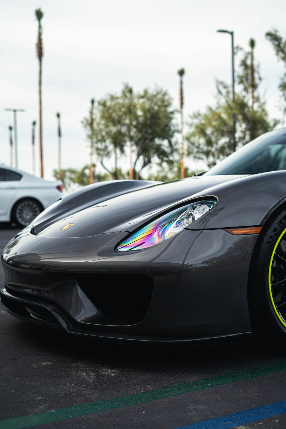 black ferrari car on road during daytime