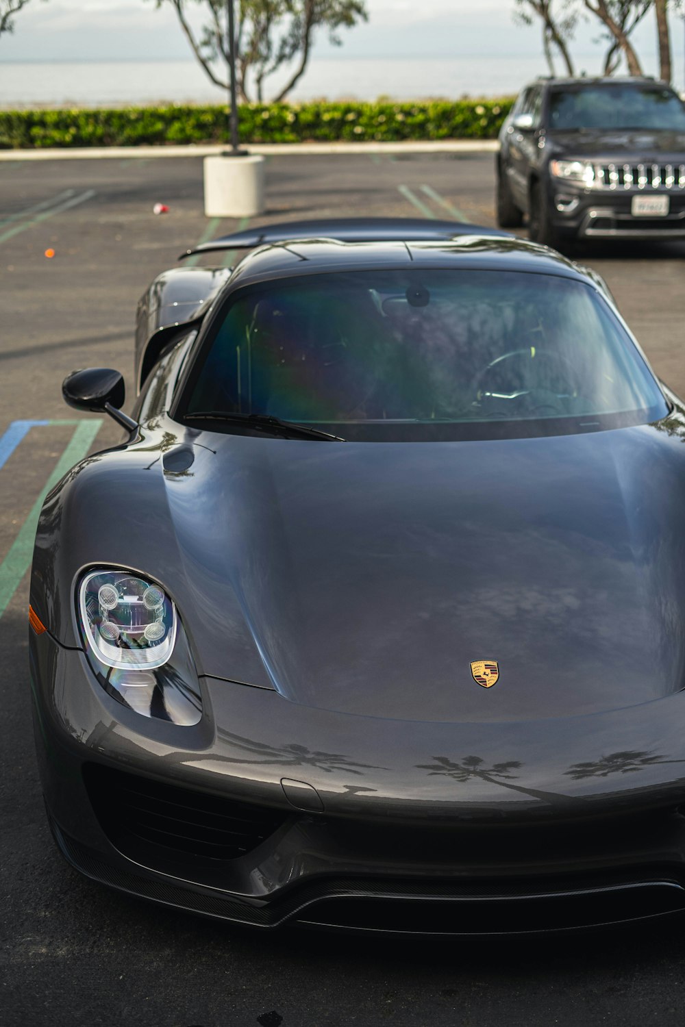 Black Porsche 911 Parked On Parking Lot During Daytime Photo Free Grey Image On Unsplash