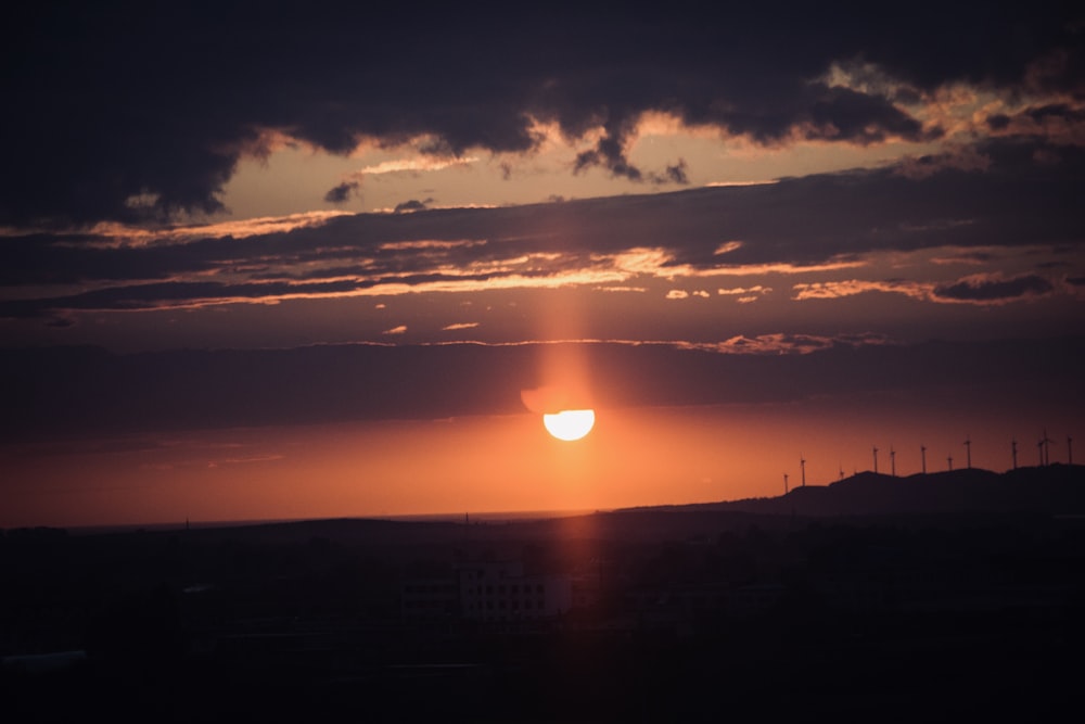 silhouette of mountain during sunset