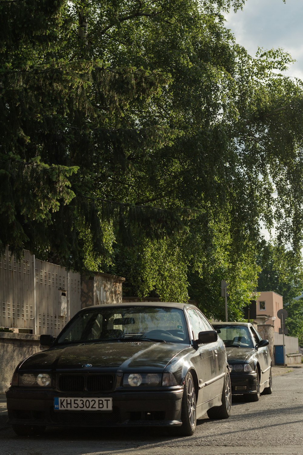 cars parked on parking lot during daytime