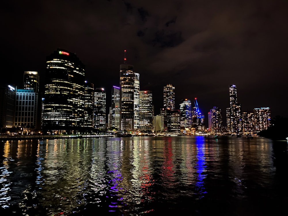 city skyline during night time