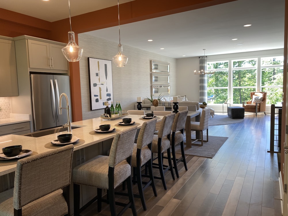 brown wooden table with chairs