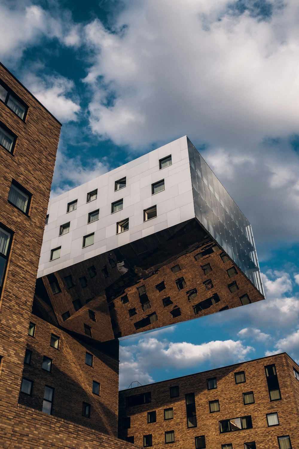 brown brick building under blue sky