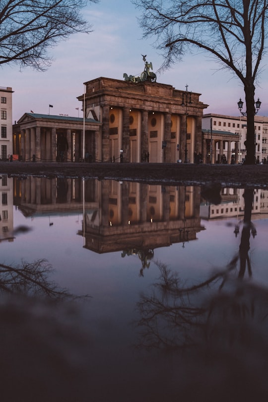 reflection of building on water in Brandenburg Gate Germany