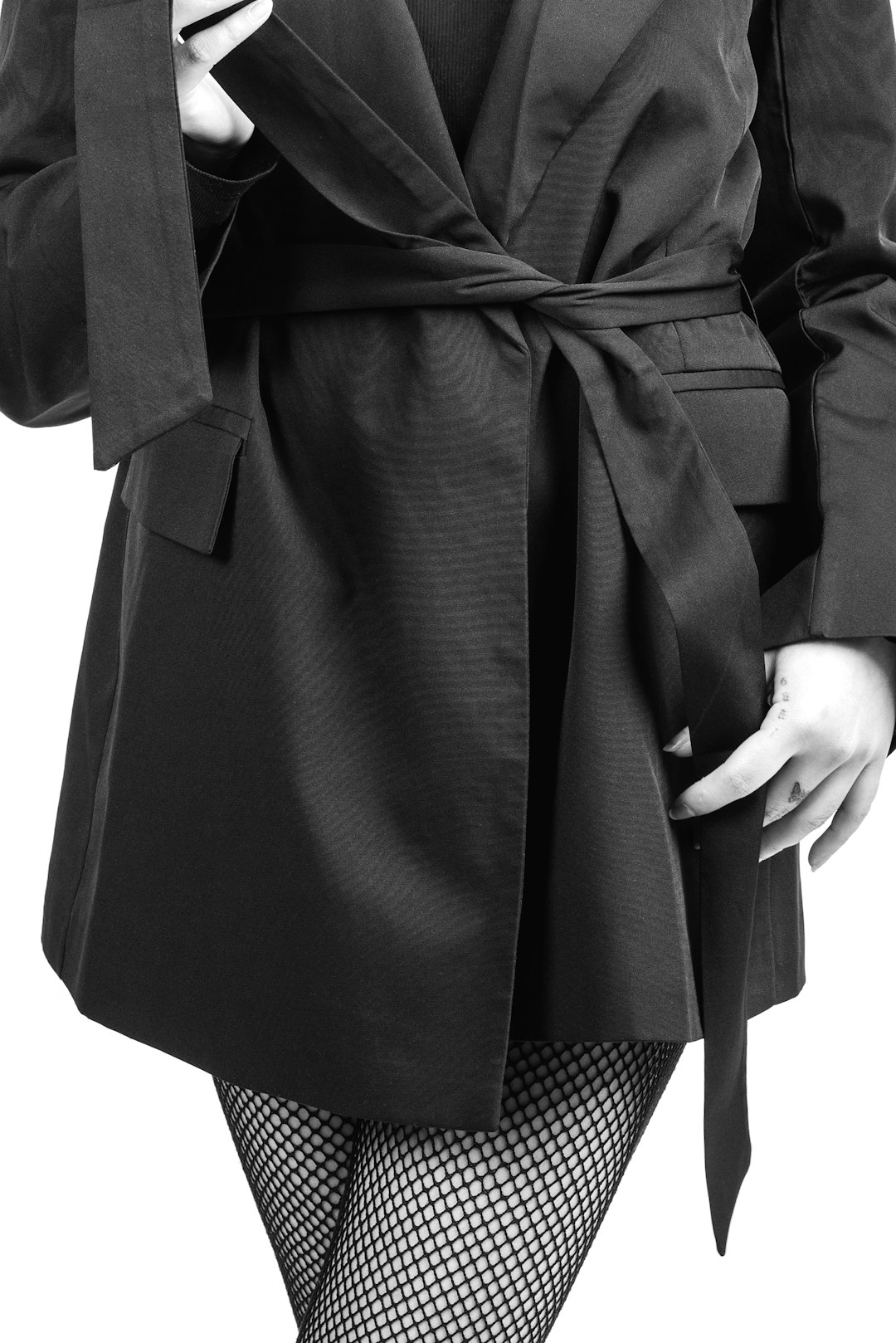 woman in black and white polka dot dress