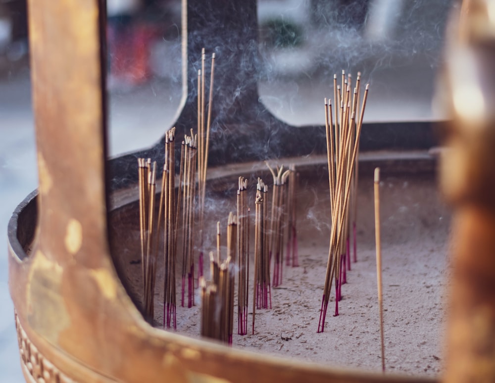 brown wooden sticks on gray concrete floor