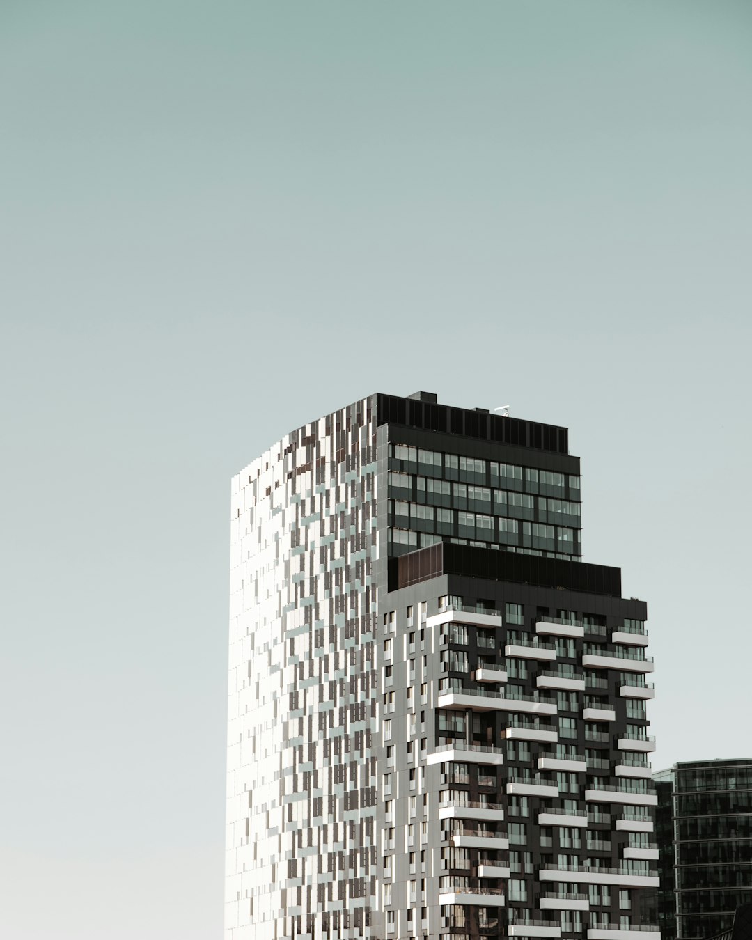 white concrete building under blue sky during daytime