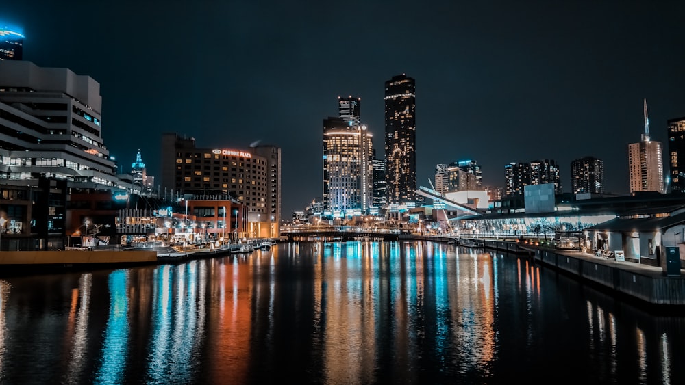 city skyline during night time