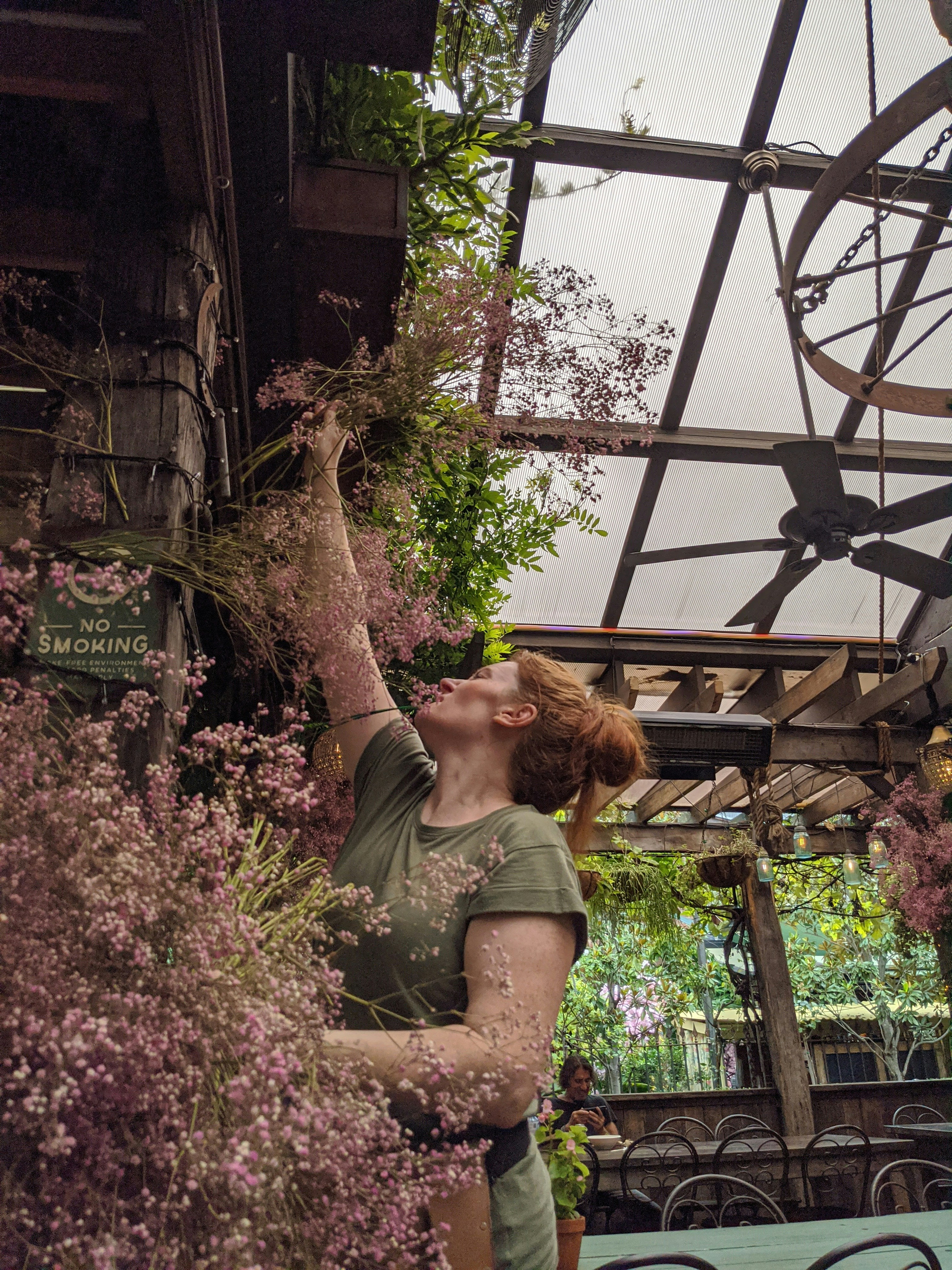 Floral architecture team creating large flower displays