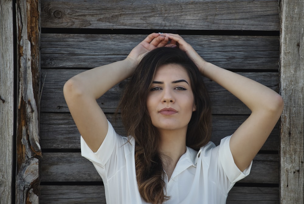 woman in white button up shirt