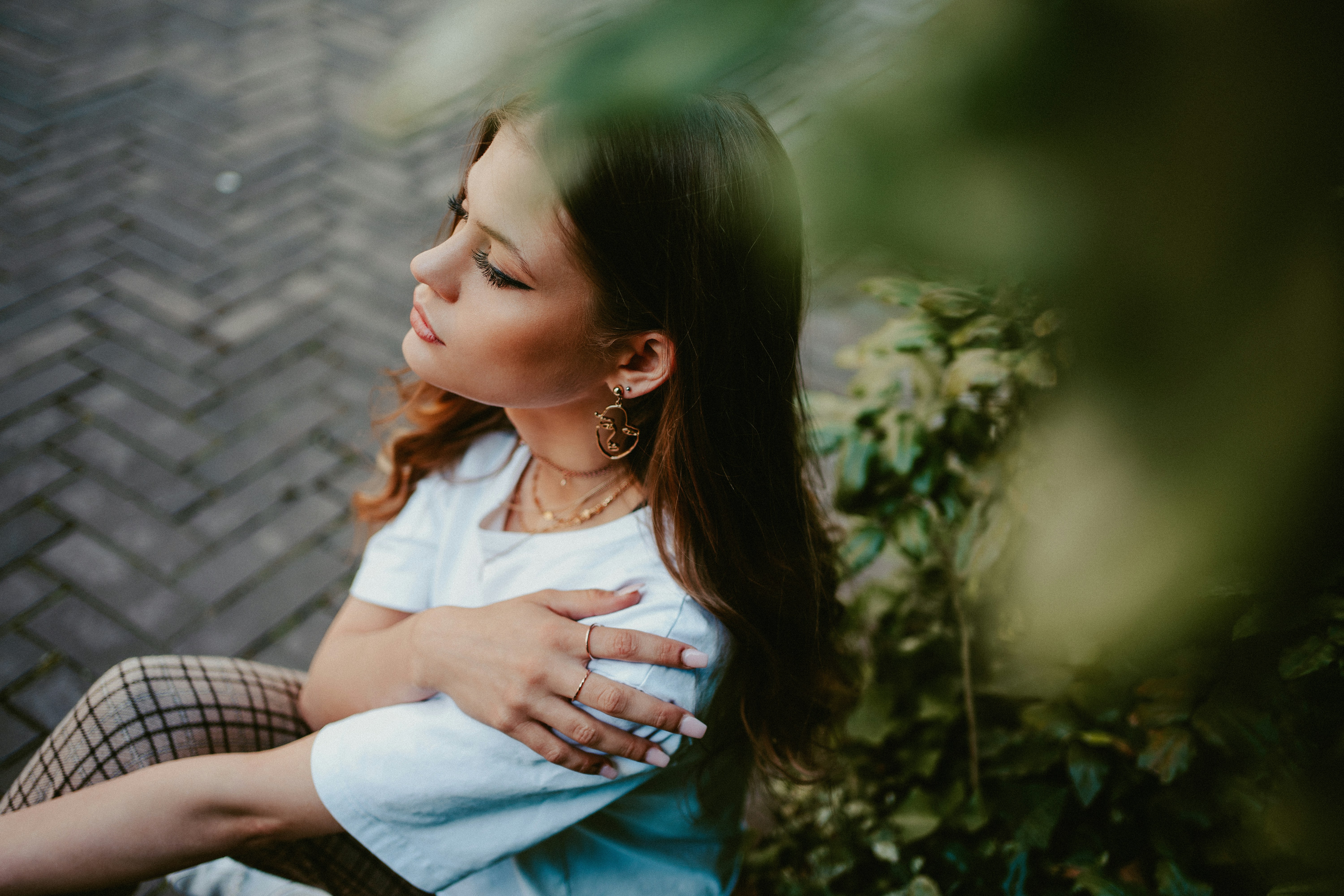 woman in white shirt wearing eyeglasses