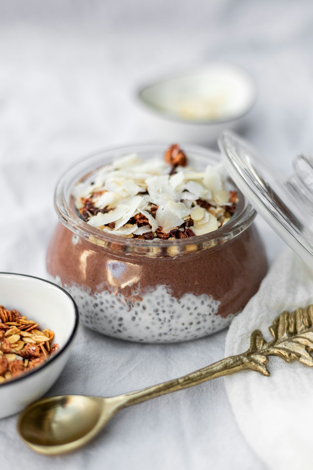 white and brown liquid in clear glass bowl