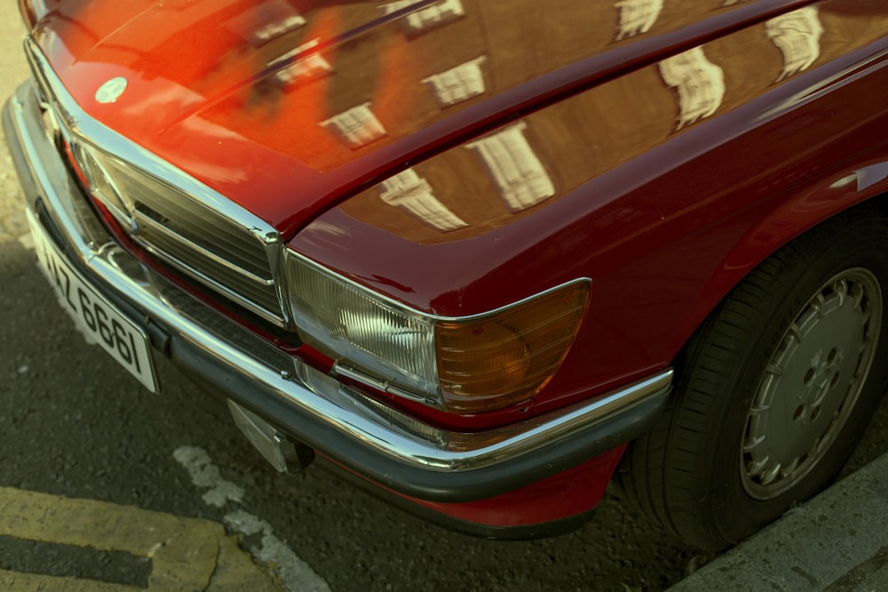 red car on gray concrete road