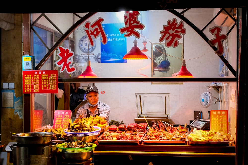 people in front of food stall