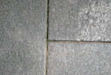 Close-up of weathered European flagstone showing natural texture and patina.