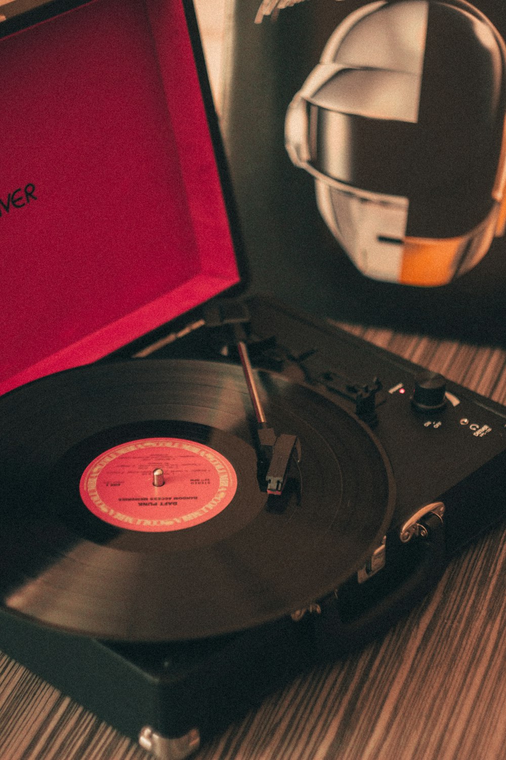 black vinyl record on vinyl record player