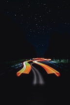 black and orange road during night time