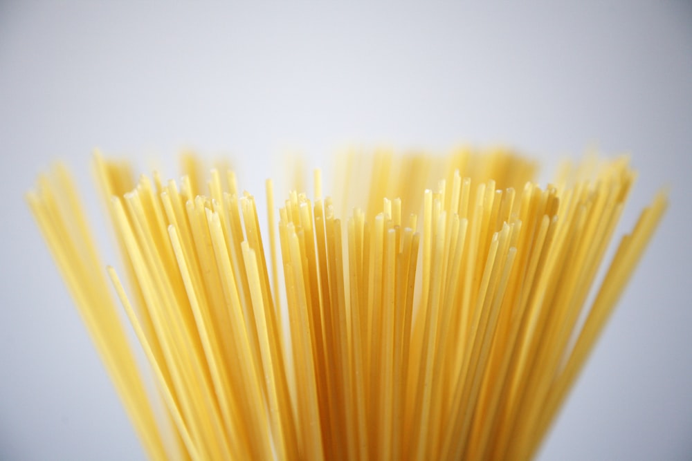 yellow stick in close up photography