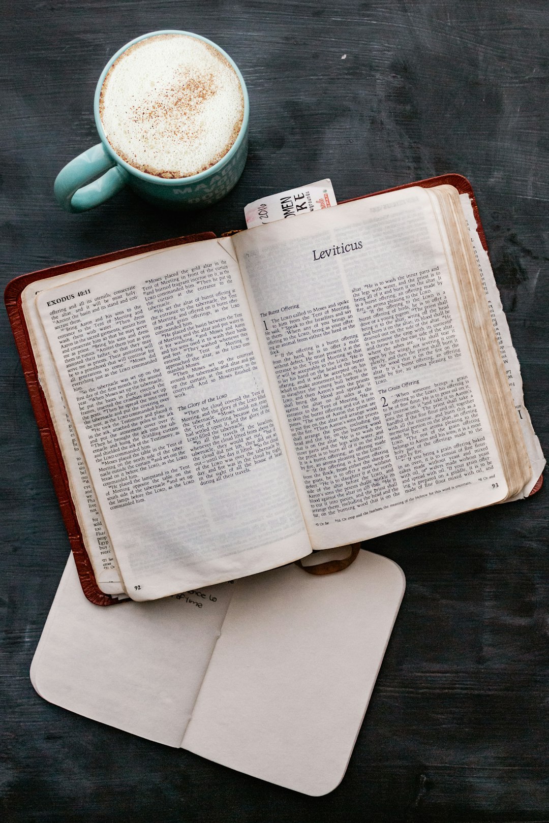 white book page on black table