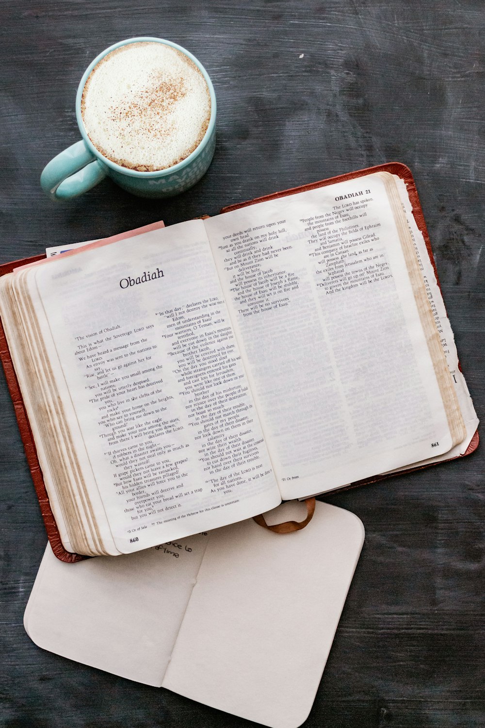 white book page on black table