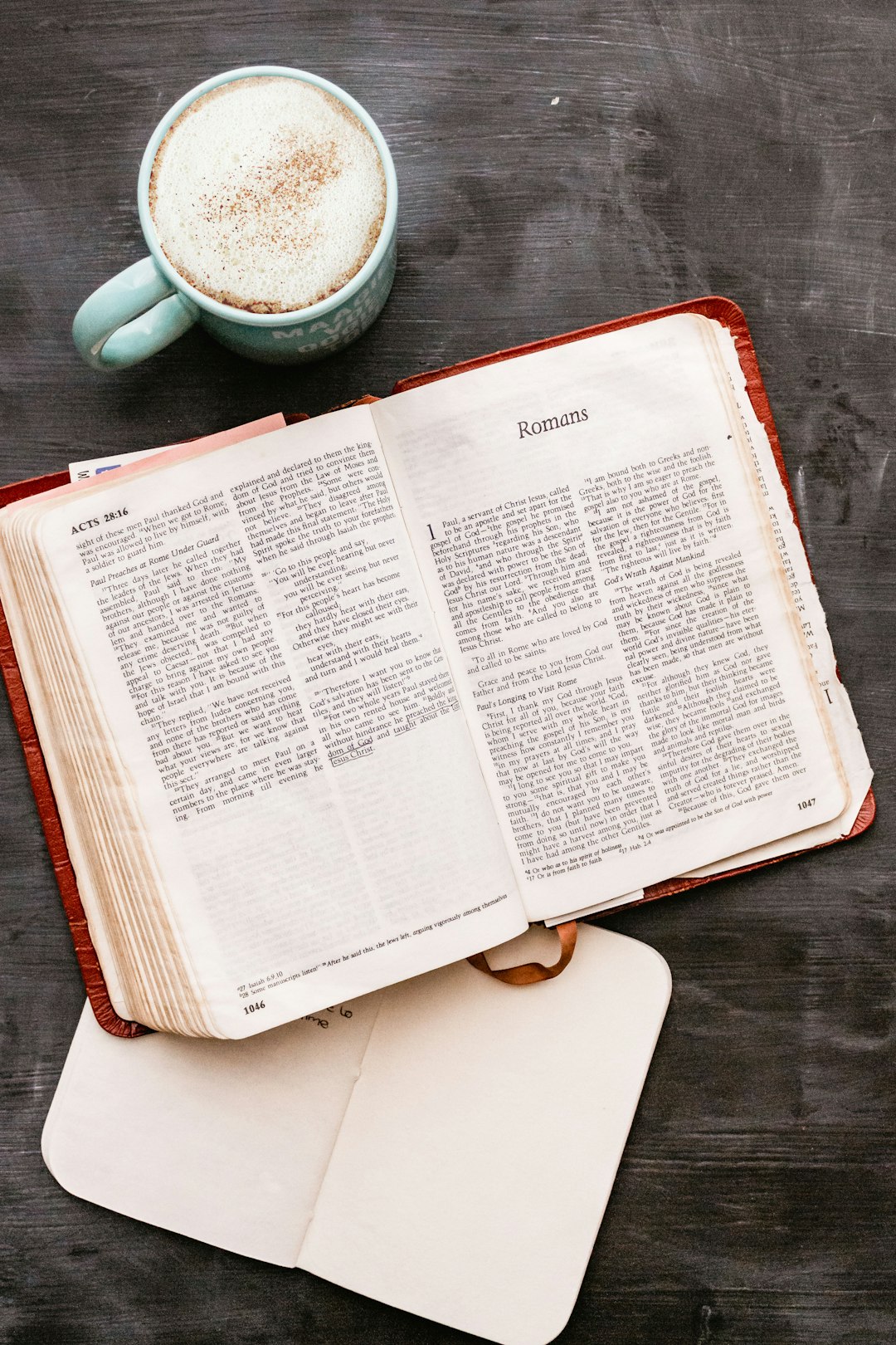 white book page on black wooden table