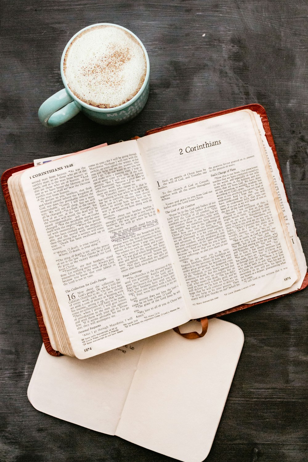 white book page on brown wooden table