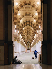 A pristine palace interior being carefully cleaned by professional staff.