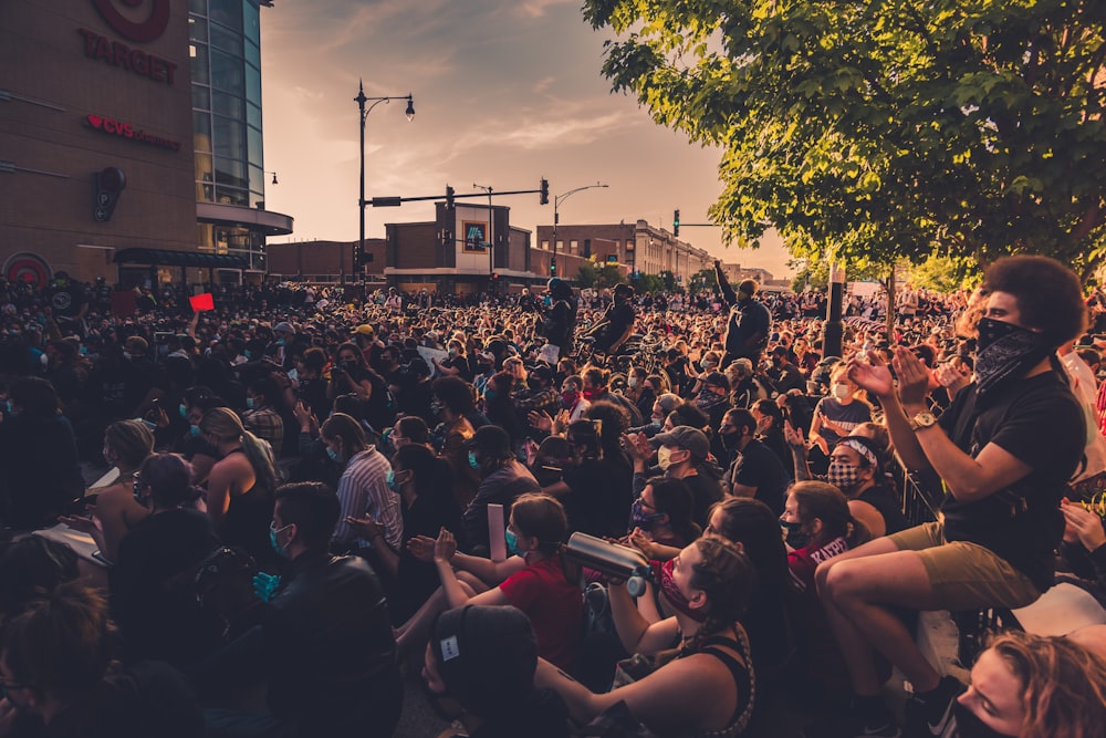 people gathering on concert during daytime