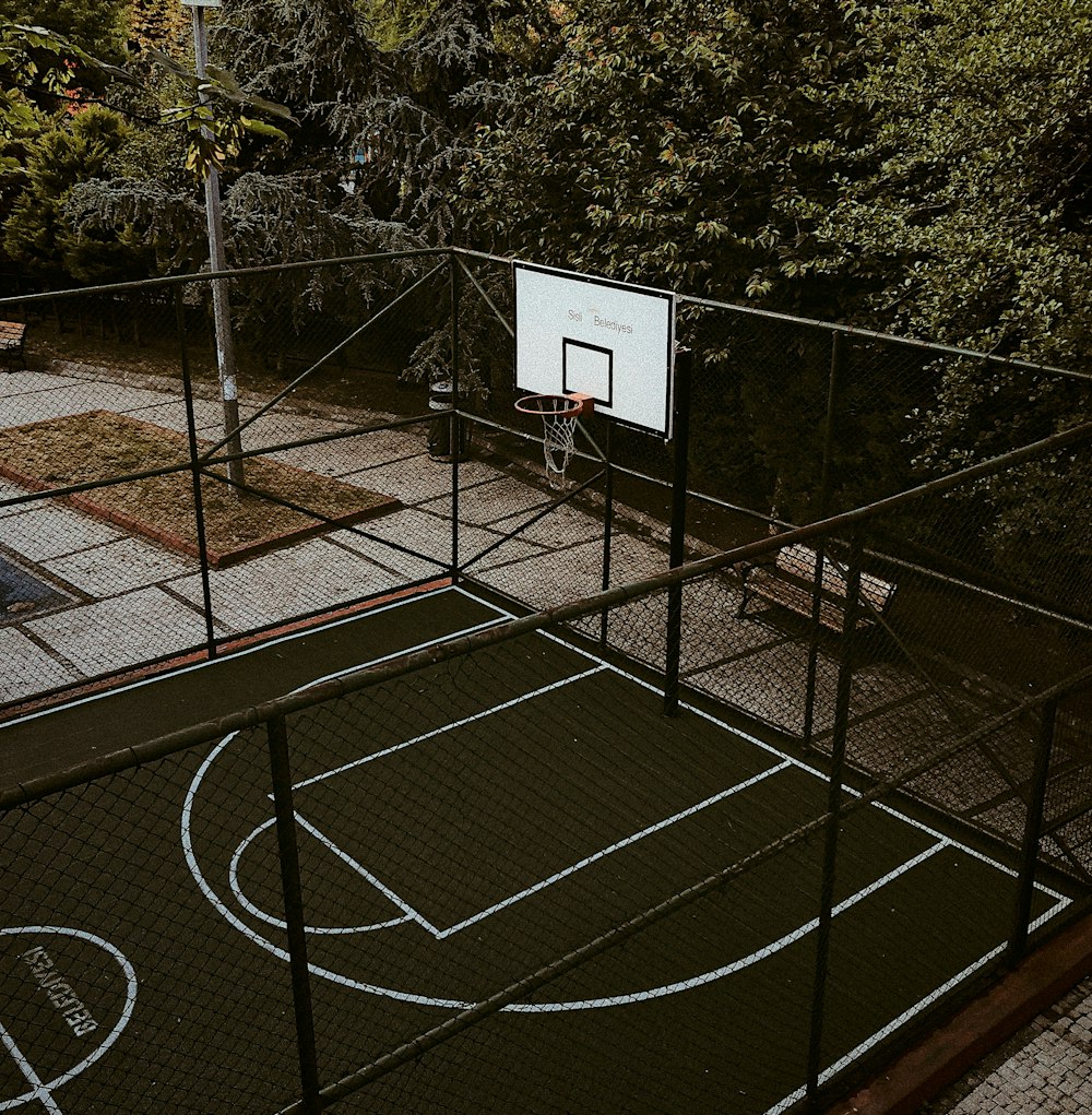 white basketball hoop on basketball court