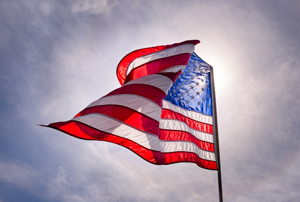 us a flag under blue sky