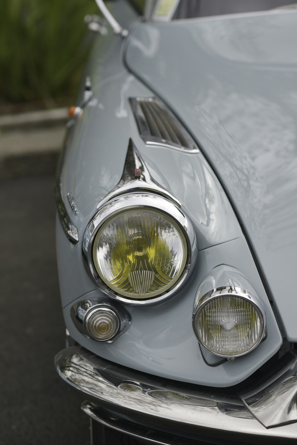 silver car with yellow light