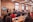people sitting on chair in front of table