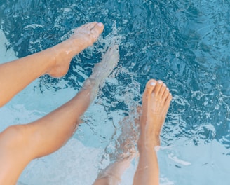 persons feet on water